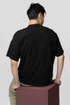 hip-hop-inspired-mokcup-of-a-man-with-an-arm-tattoo-wearing-an-oversized-tee-m39868.png